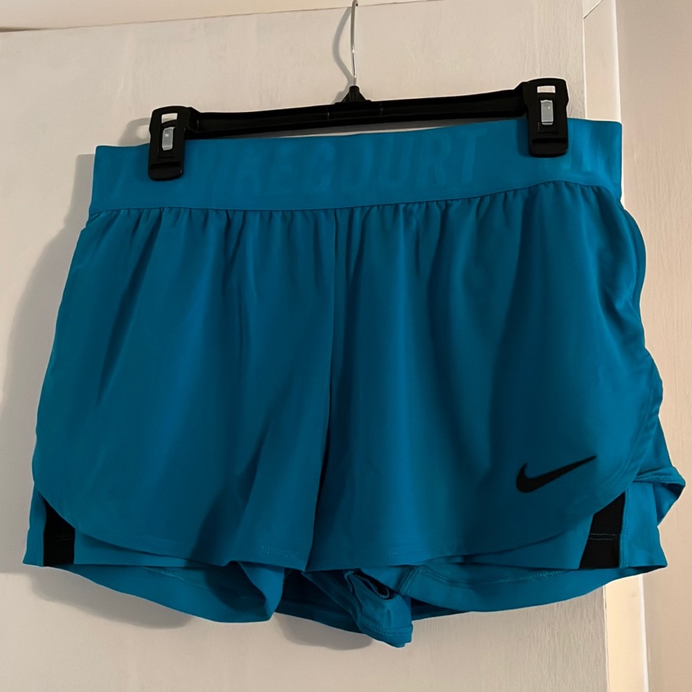Women’s Turquoise Nike spandex shorts- size large